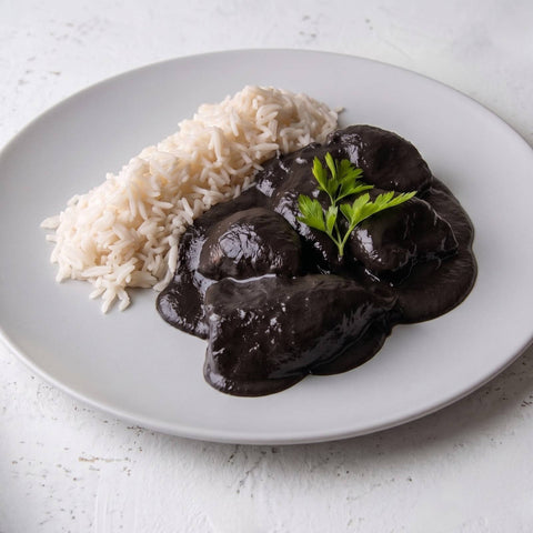 Chipirones en su tinta con arroz blanco