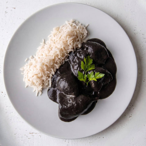 Chipirones en su tinta con arroz blanco