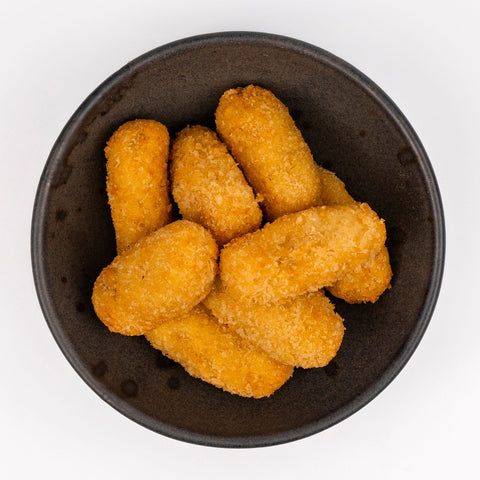 Vista cenital croquetas de papa con jamón
