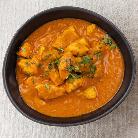 Vista cenital pollo tikka masala