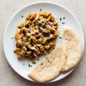 Shawarma de pollo con pan pita